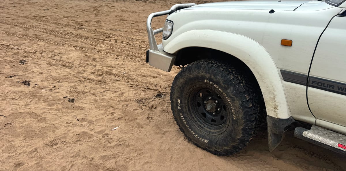 Steel, rubber, sand.