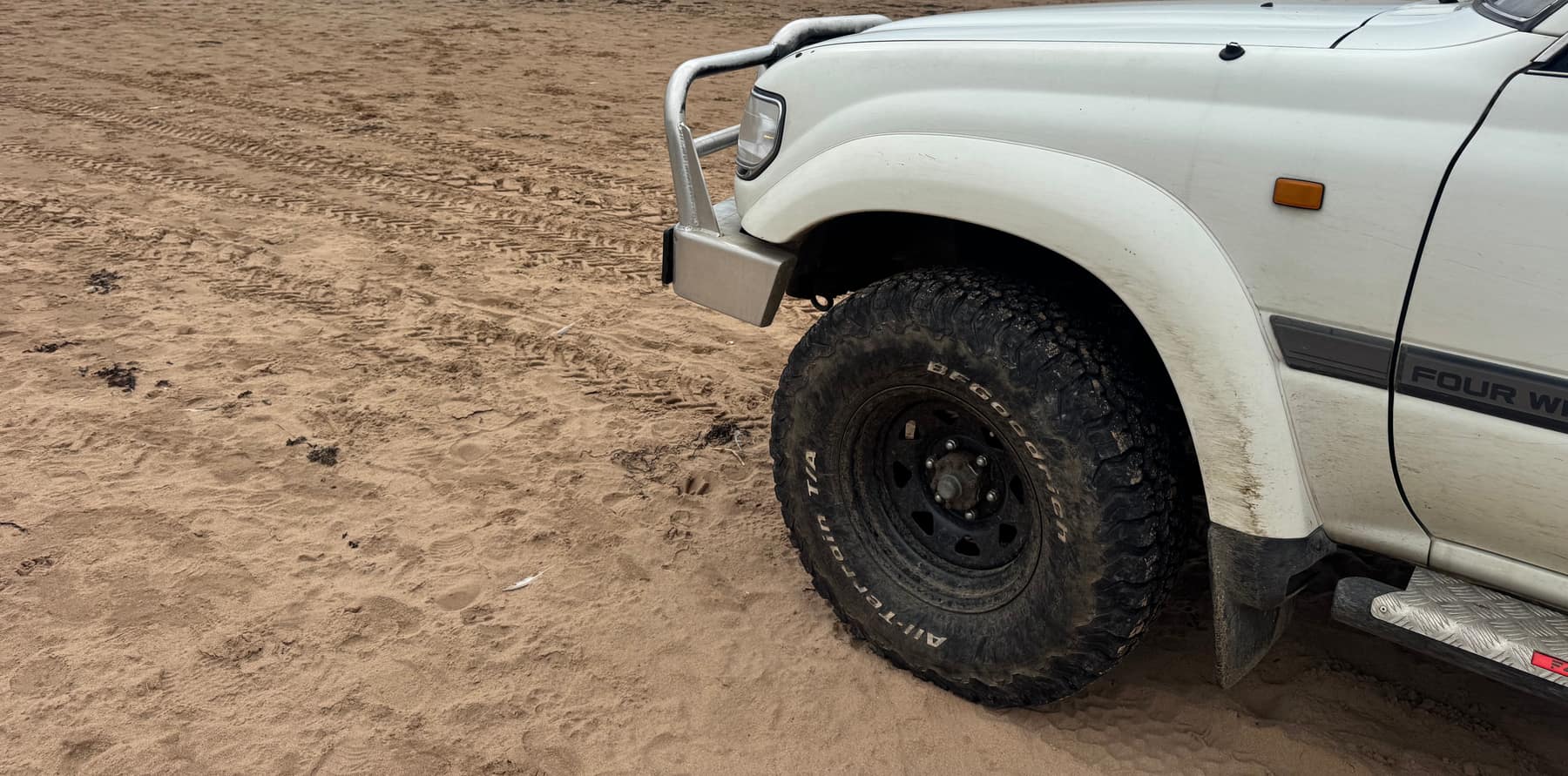 Steel, rubber, sand.